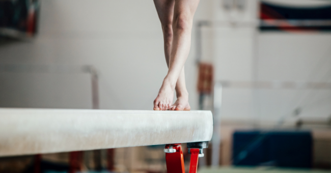 Gymnast on balancing beam
