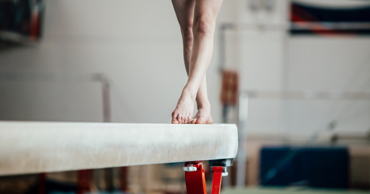 Gymnast on balancing beam