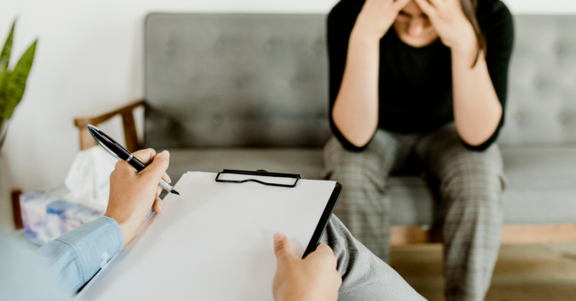 Therapist interviews patient