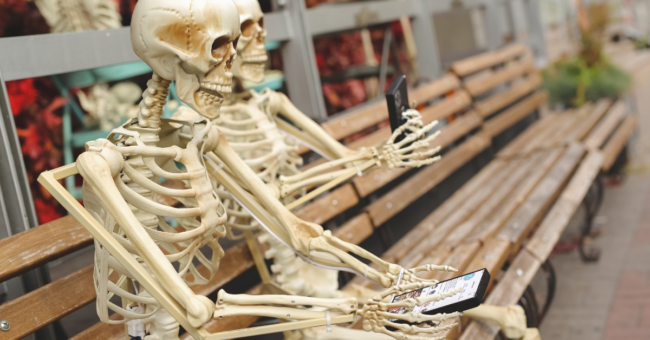 two "nerve"ous skeletons on a date