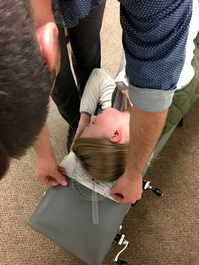 Positioning a patients head to properly be realligned