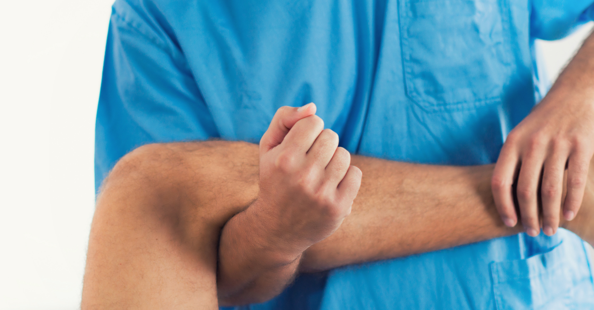 Chiropractor doing a leg adjustment